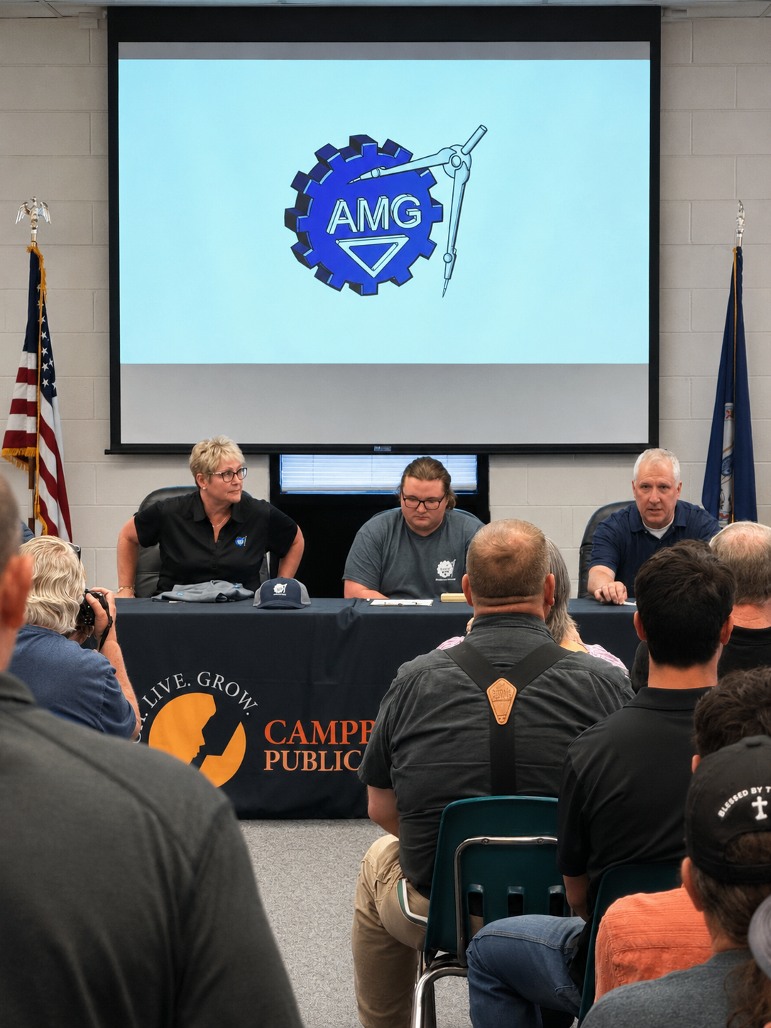 Panel view of the 2026 CTE Signing Day event with AMG representatives and attendees gathered in the room.