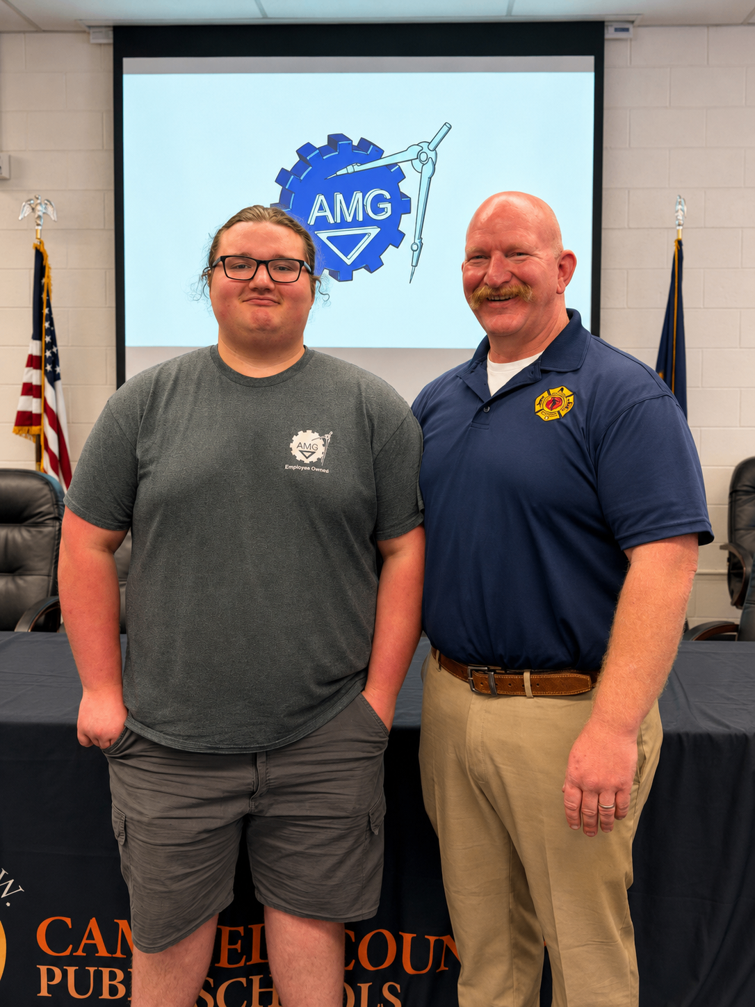 Joey Copes posing with a community partner during the 2026 Campbell County Schools CTE Signing Day.